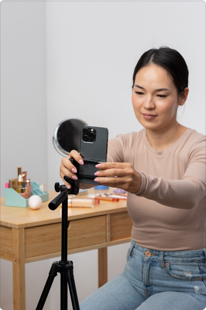 screenshot 2025 10 25 at 20 07 28 woman setting her smartphone for video recording photos by canva